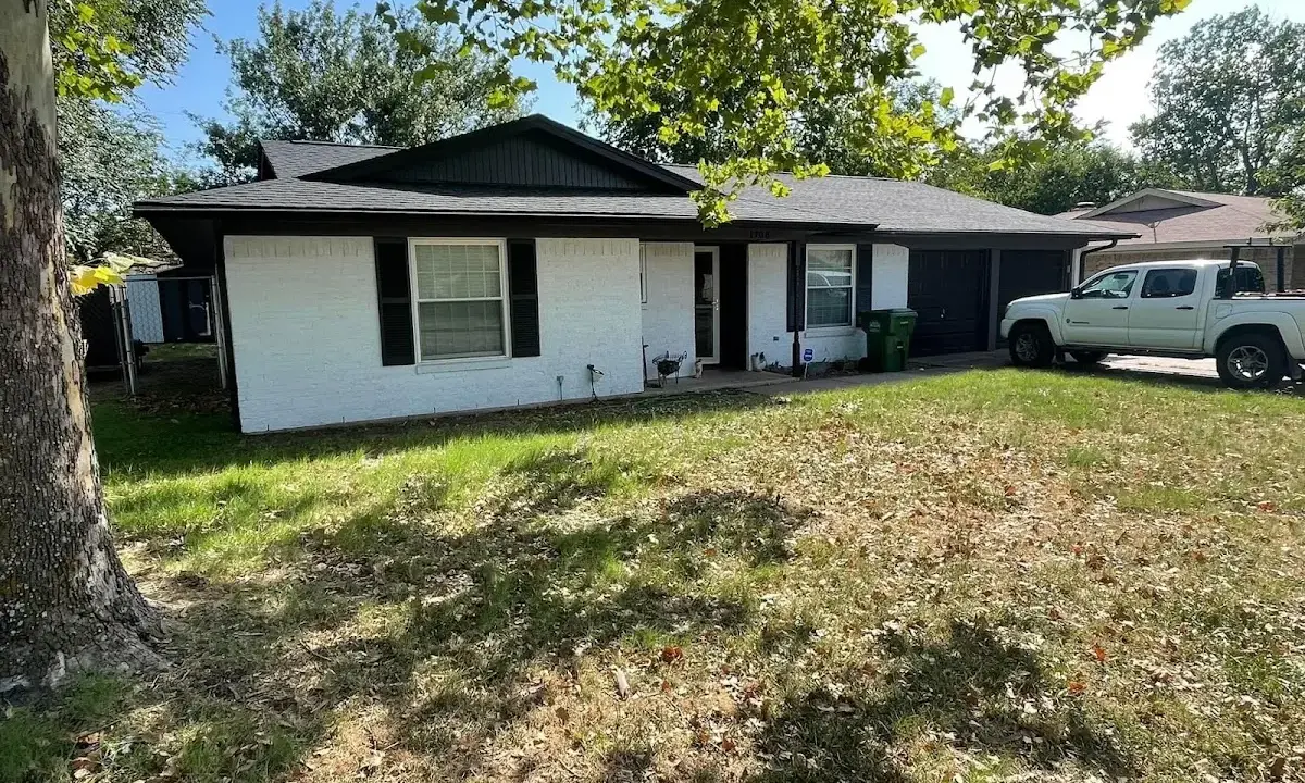 Professional roofing crew working on a residential roof in Temple Hills